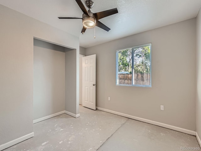 1731 Uinta St, Denver, CO 80220 - unfurnished bedroom featuring concrete floors and ceiling fan