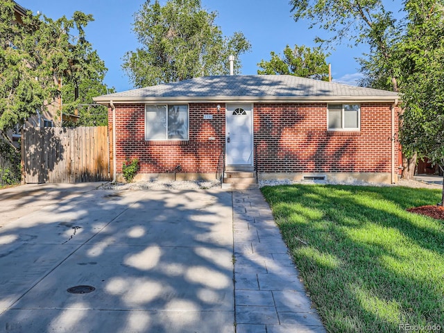 1731 Uinta St, Denver, CO 80220 - view of front of home with entry steps, brick siding, and roof with shingles