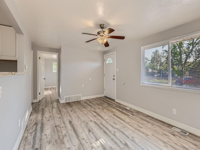 1731 Uinta St, Denver, CO 80220 - unfurnished room with light wood-type flooring and a ceiling fan