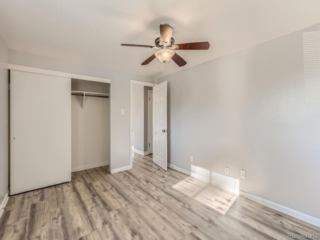 1731 Uinta St, Denver, CO 80220 - unfurnished bedroom with a closet, light wood-type flooring, and a ceiling fan