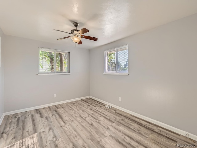 1731 Uinta St, Denver, CO 80220 - spare room featuring light wood-type flooring and a ceiling fan