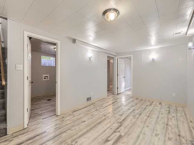 1731 Uinta St, Denver, CO 80220 - spare room featuring wood finished floors and stairway