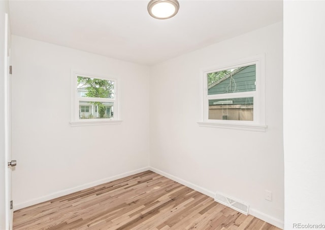 1780 Alton St, Aurora, CO 80010 - spare room with light wood finished floors and baseboards