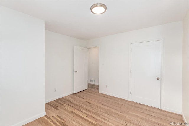 1780 Alton St, Aurora, CO 80010 - unfurnished bedroom with light wood-type flooring and baseboards