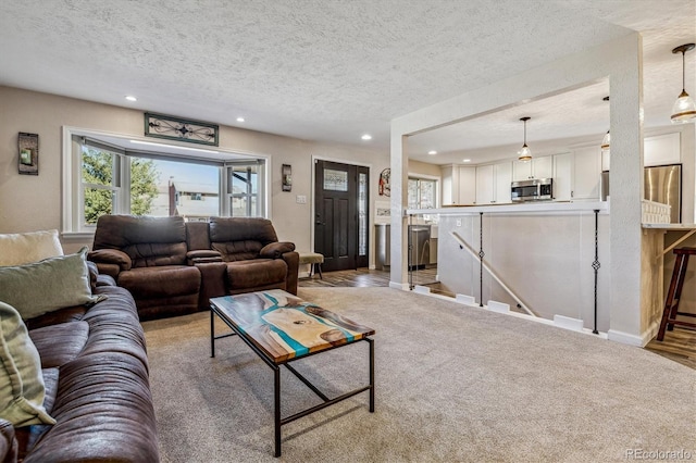 living room featuring a textured ceiling