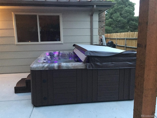 view of patio with a hot tub