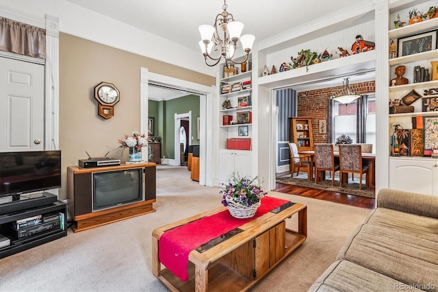 912 S Washington St, Denver, CO 80209 - carpeted living room featuring a chandelier, built in features, and crown molding