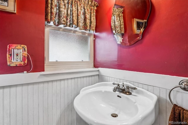 912 S Washington St, Denver, CO 80209 - bathroom with a sink and a wainscoted wall