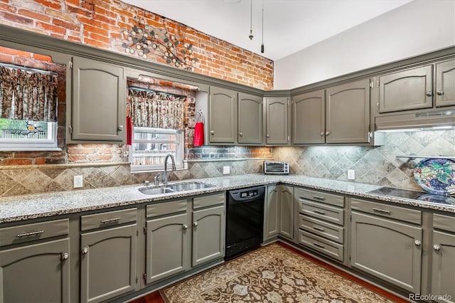 912 S Washington St, Denver, CO 80209 - kitchen with black appliances, under cabinet range hood, decorative backsplash, and gray cabinetry