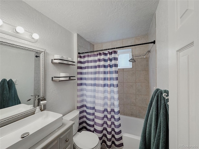 bathroom with shower / tub combo, a textured wall, toilet, a textured ceiling, and vanity