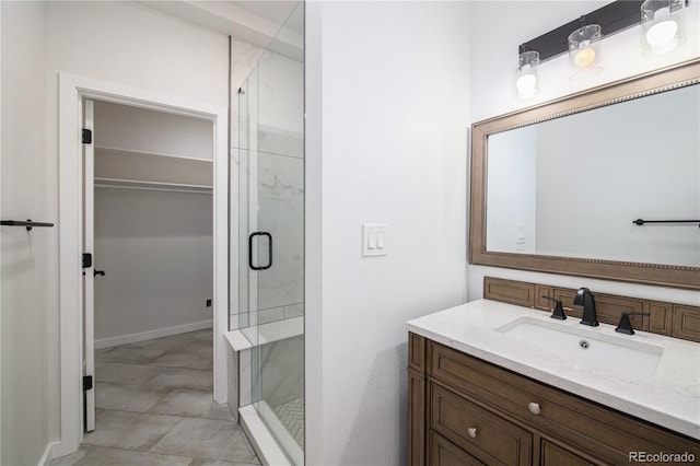 bathroom with vanity and walk in shower