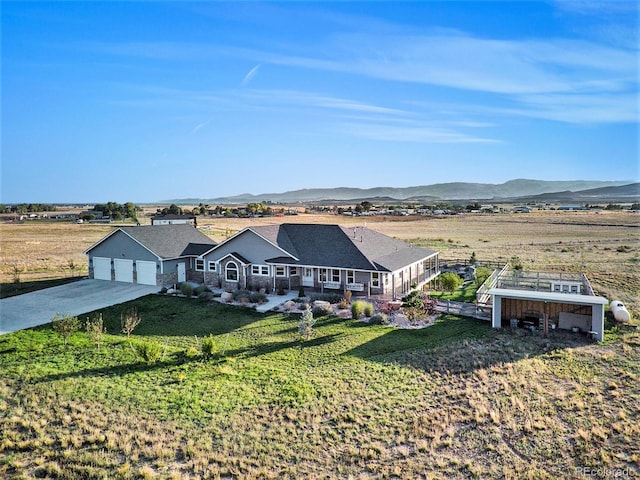 exterior space with a mountain view and a rural view