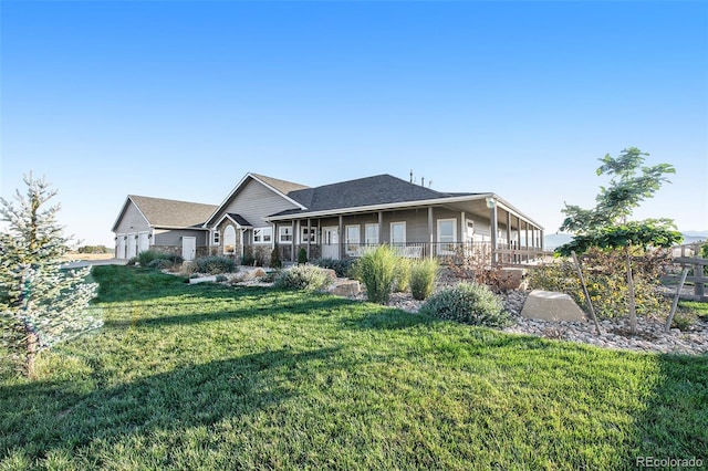 view of front of home with a porch and a front lawn