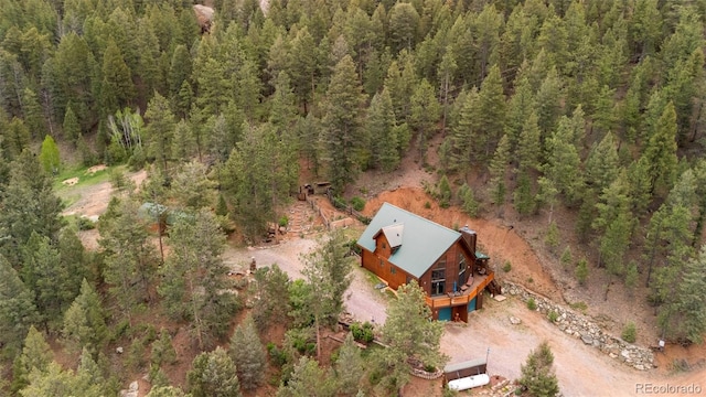 27264 Schuyler Gulch Rd, Pine, CO 80470 - aerial view of property's location featuring a heavily wooded area