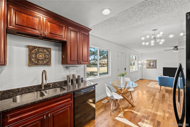 kitchen with a sink, light wood finished floors, black dishwasher, and dark brown cabinets