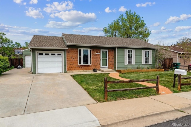 8625 W Dartmouth Pl, Lakewood, CO 80227 - single story home with concrete driveway, an attached garage, brick siding, and a shingled roof