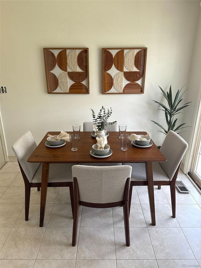 8625 W Dartmouth Pl, Lakewood, CO 80227 - dining area featuring light tile patterned flooring