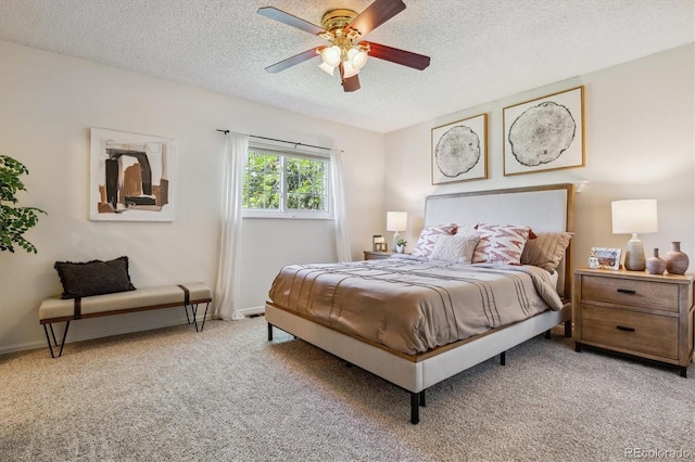 8625 W Dartmouth Pl, Lakewood, CO 80227 - bedroom featuring a textured ceiling, light carpet, a ceiling fan, and baseboards