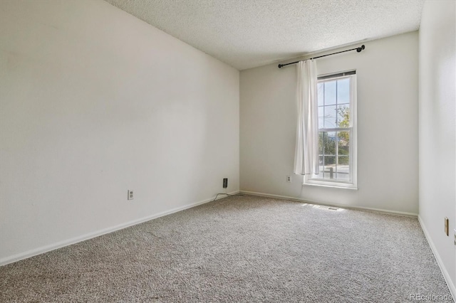 8625 W Dartmouth Pl, Lakewood, CO 80227 - carpeted spare room featuring a textured ceiling and baseboards