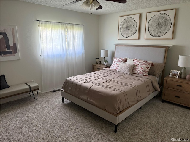 8625 W Dartmouth Pl, Lakewood, CO 80227 - bedroom with light colored carpet, a textured ceiling, and ceiling fan