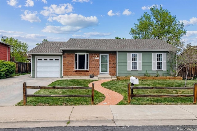 8625 W Dartmouth Pl, Lakewood, CO 80227 - ranch-style house featuring an attached garage, driveway, a shingled roof, and brick siding