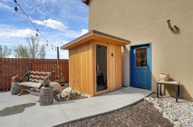 656 S Gunnison Ave, Buena Vista, CO 81211 - entrance to property with fence, stucco siding, and a patio area