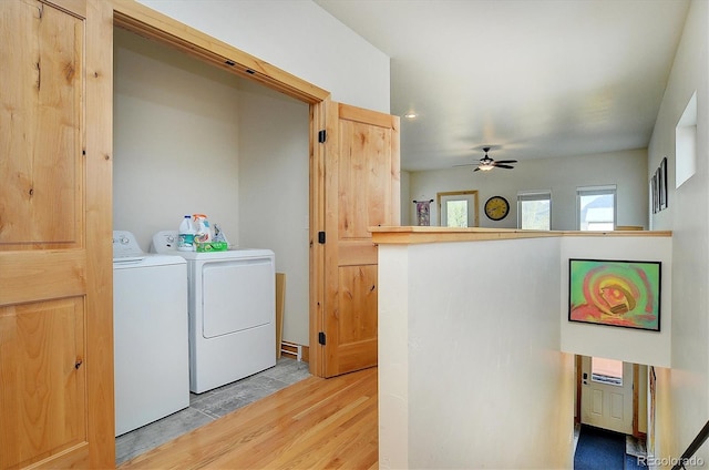 656 S Gunnison Ave, Buena Vista, CO 81211 - washroom featuring laundry area, washing machine and dryer, ceiling fan, and light wood-style flooring