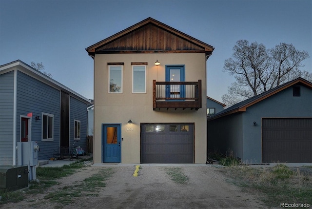 656 S Gunnison Ave, Buena Vista, CO 81211 - mediterranean / spanish home with an attached garage, stucco siding, driveway, and a balcony