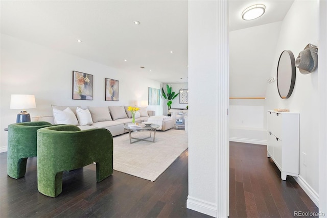 living room with dark hardwood / wood-style floors