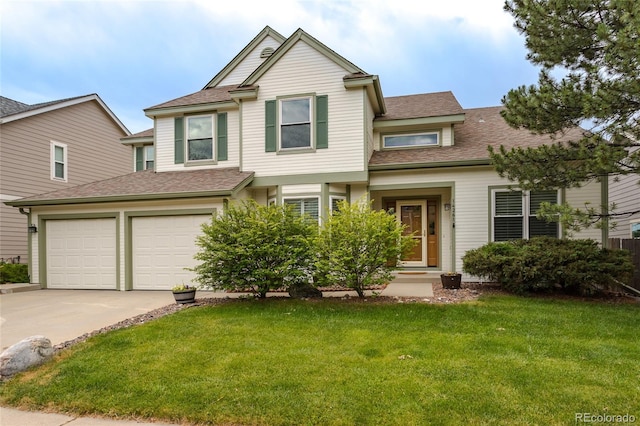 14261 W Evans Cir, Lakewood, CO 80228 - view of front of property with concrete driveway, a front lawn, and a shingled roof