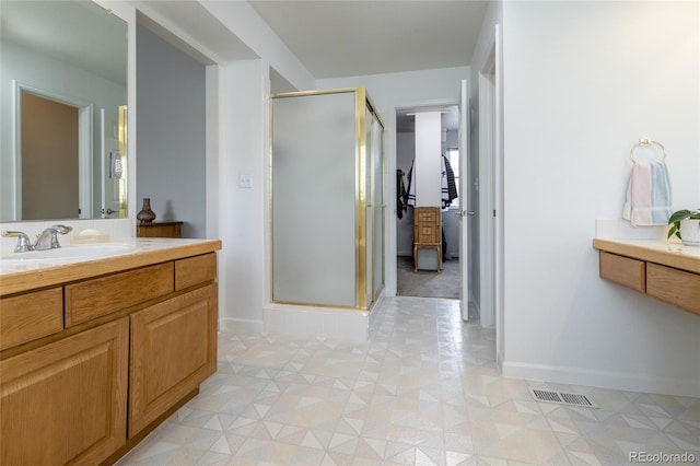 14261 W Evans Cir, Lakewood, CO 80228 - bathroom with a shower stall and vanity