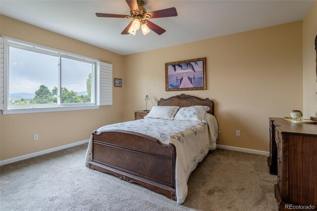 14261 W Evans Cir, Lakewood, CO 80228 - carpeted bedroom with baseboards and ceiling fan