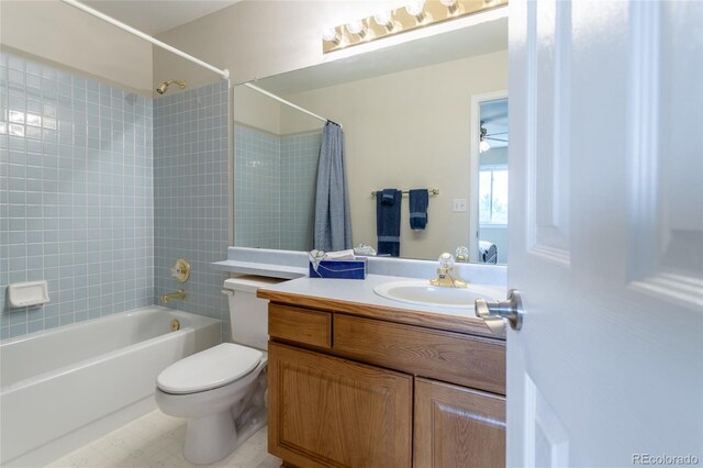 14261 W Evans Cir, Lakewood, CO 80228 - bathroom featuring shower / bath combo with shower curtain and vanity