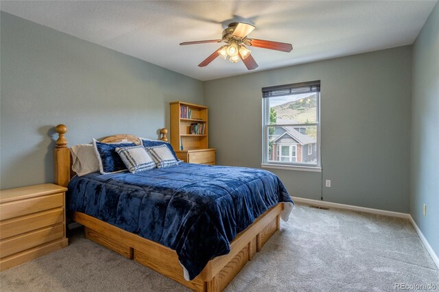 14261 W Evans Cir, Lakewood, CO 80228 - bedroom with carpet flooring and ceiling fan