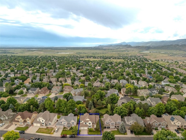 14261 W Evans Cir, Lakewood, CO 80228 - aerial view of residential area featuring property boundaries highlighted and mountains
