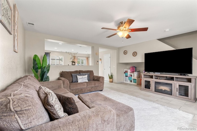 living room with ceiling fan