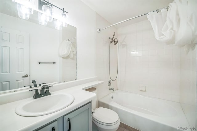 10303 E Peakview Ave Unit G203, Englewood, CO 80111 - bathroom with toilet, shower / tub combo with curtain, and vanity