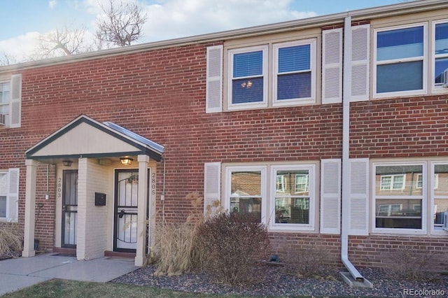 multi unit property featuring brick siding