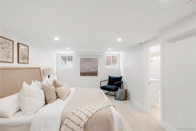bedroom featuring connected bathroom, recessed lighting, baseboards, and light carpet