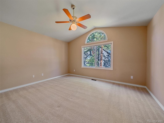 4228 Scenic Village Dr, Evergreen, CO 80439 - empty room featuring lofted ceiling, ceiling fan, light carpet, and baseboards
