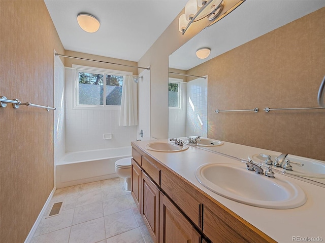 4228 Scenic Village Dr, Evergreen, CO 80439 - full bath with toilet, double vanity, baseboards, shower / washtub combination, and tile patterned flooring