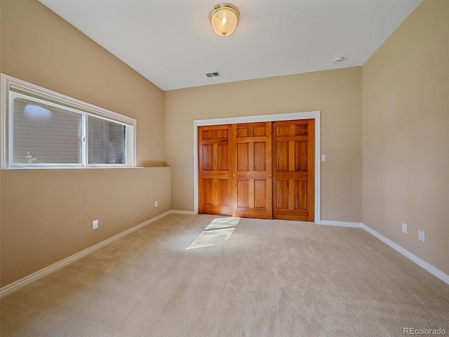 4228 Scenic Village Dr, Evergreen, CO 80439 - unfurnished bedroom featuring carpet, baseboards, and a closet