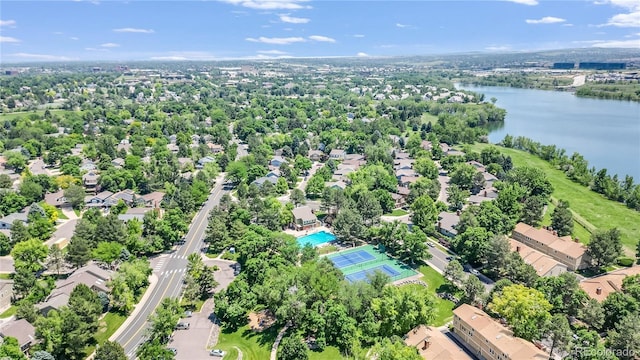 aerial view of residential area with a large body of water
