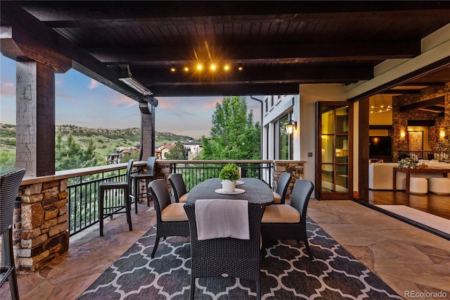 7208 Raphael Ln, Littleton, CO 80125 - view of patio / terrace with a balcony