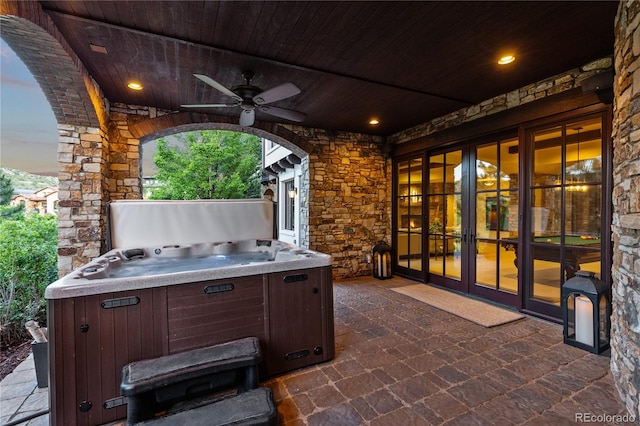 7208 Raphael Ln, Littleton, CO 80125 - view of patio with a hot tub, a ceiling fan, and french doors
