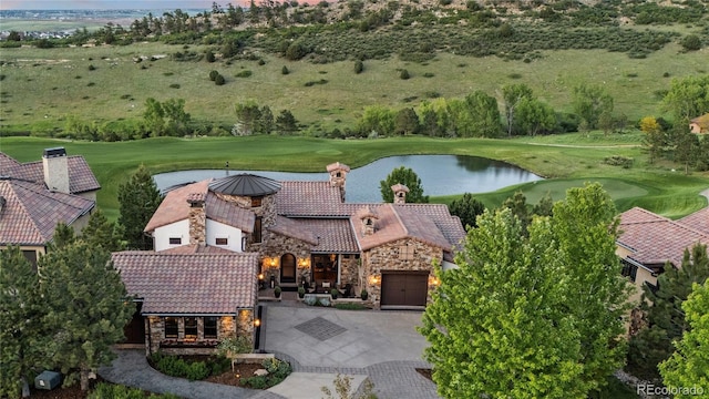 7208 Raphael Ln, Littleton, CO 80125 - bird's eye view of a golf course and a nearby body of water