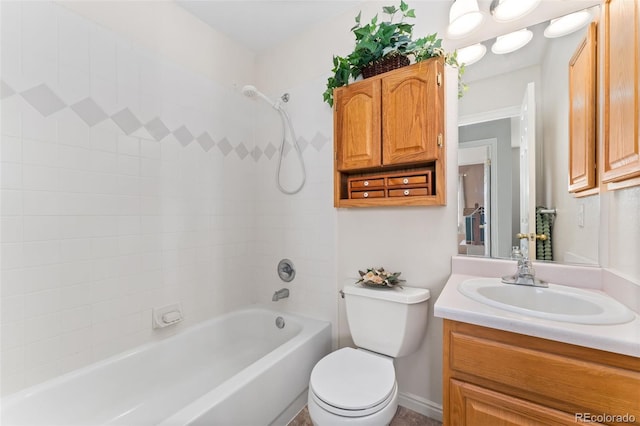 full bath with vanity, toilet, and bathing tub / shower combination