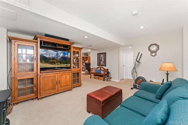 living area featuring light colored carpet, recessed lighting, and baseboards