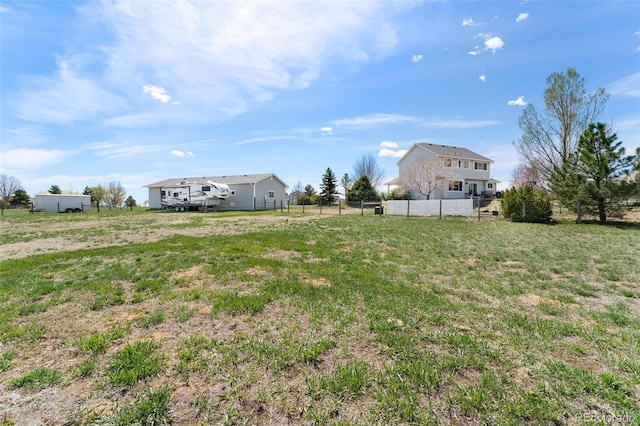 view of yard with fence