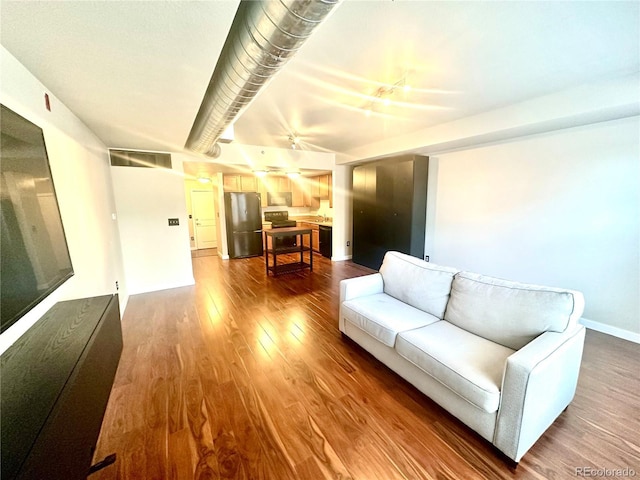 living room with wood-type flooring